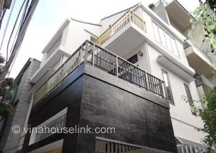 Lovely cozy house with 3 bedrooms for rent in Dang Thai Mai Street